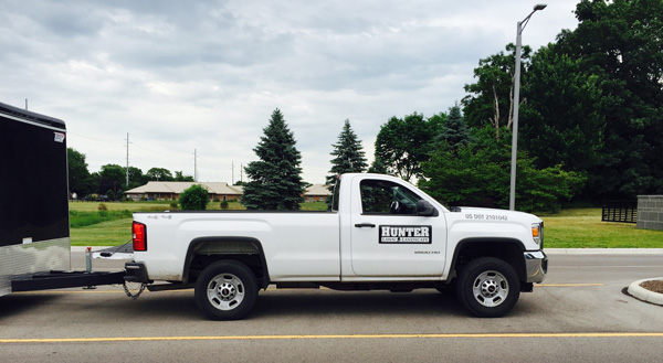 White Hunter Lawn Service Truck